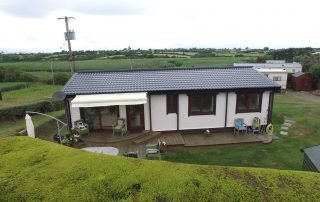 Loghouse.ie log cabin. Top quality log house products.