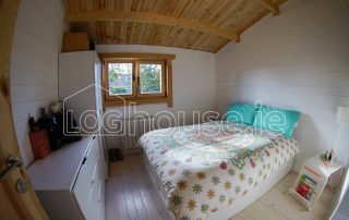 One Bed Log Cabin Bedroom